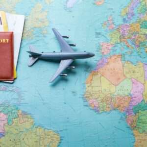 Passport and tickets on map
